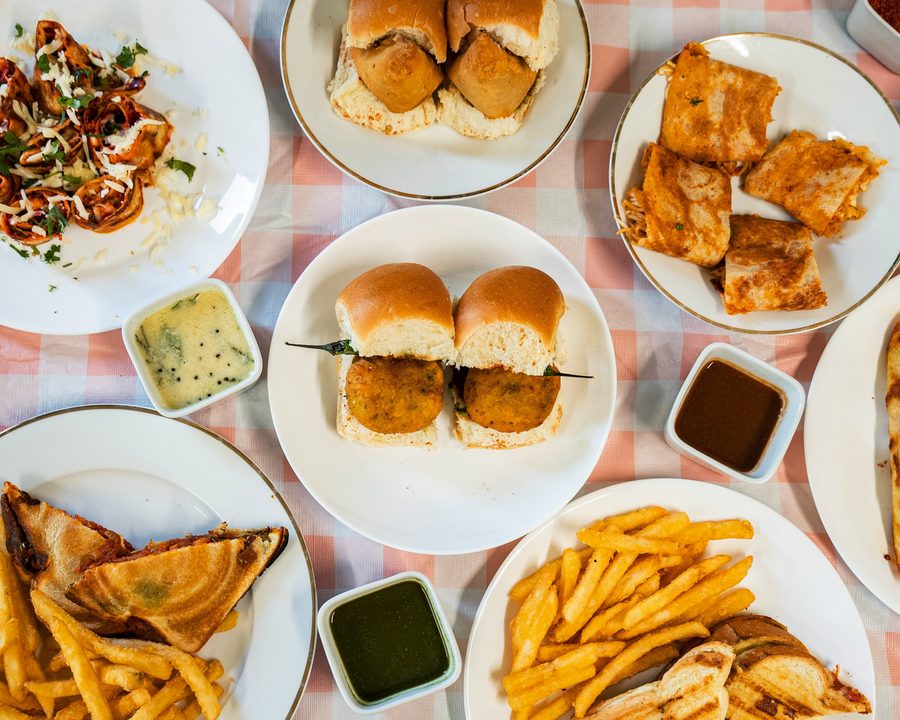 A spread of authentic Mumbai street food &ndash; vada pav, pav bhaji, dosa and chaat &ndash; from Preeti's in Vancouver